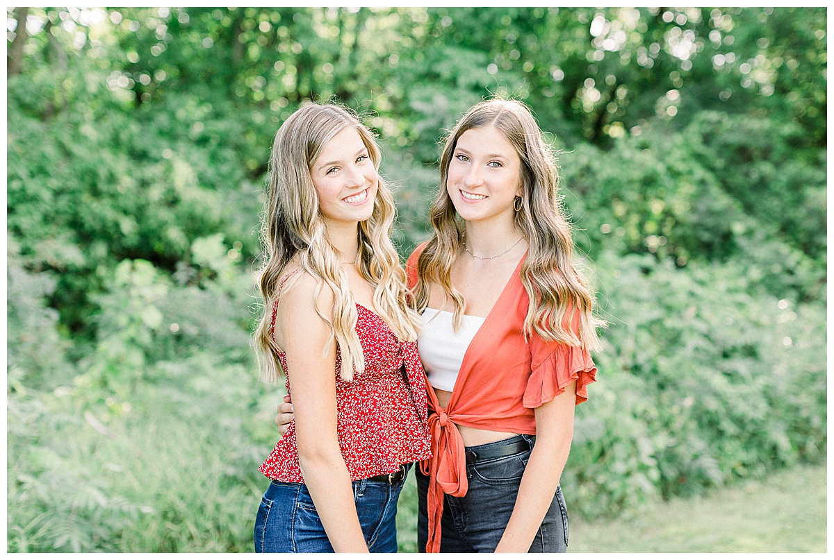 Twins smiling for senior pictures