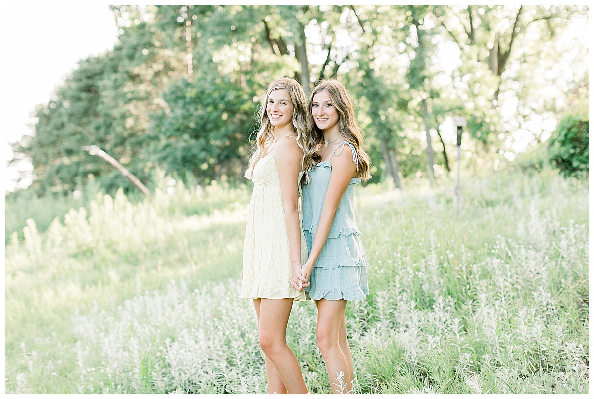 Twin sisters in a field