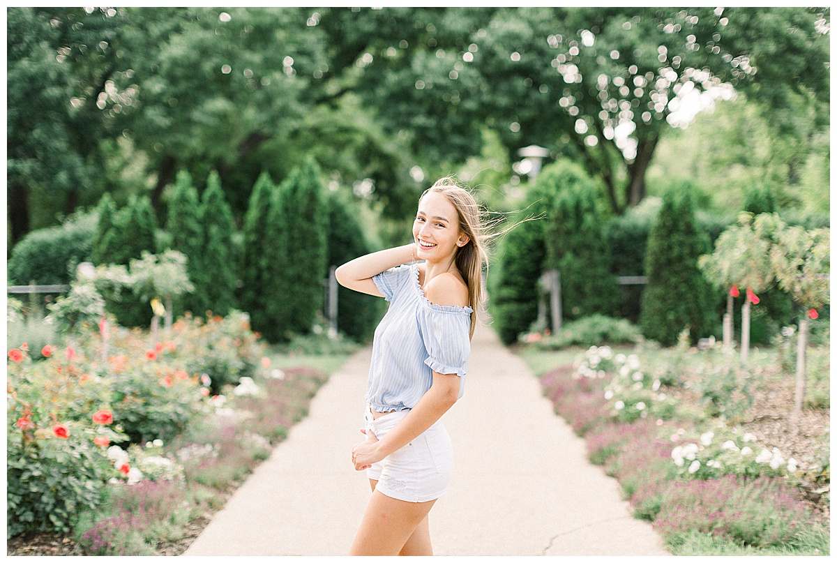 girl on path at lyndale rose garden