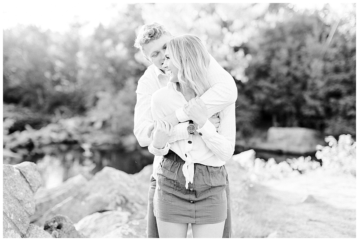 couple cuddling at quarry park photo session