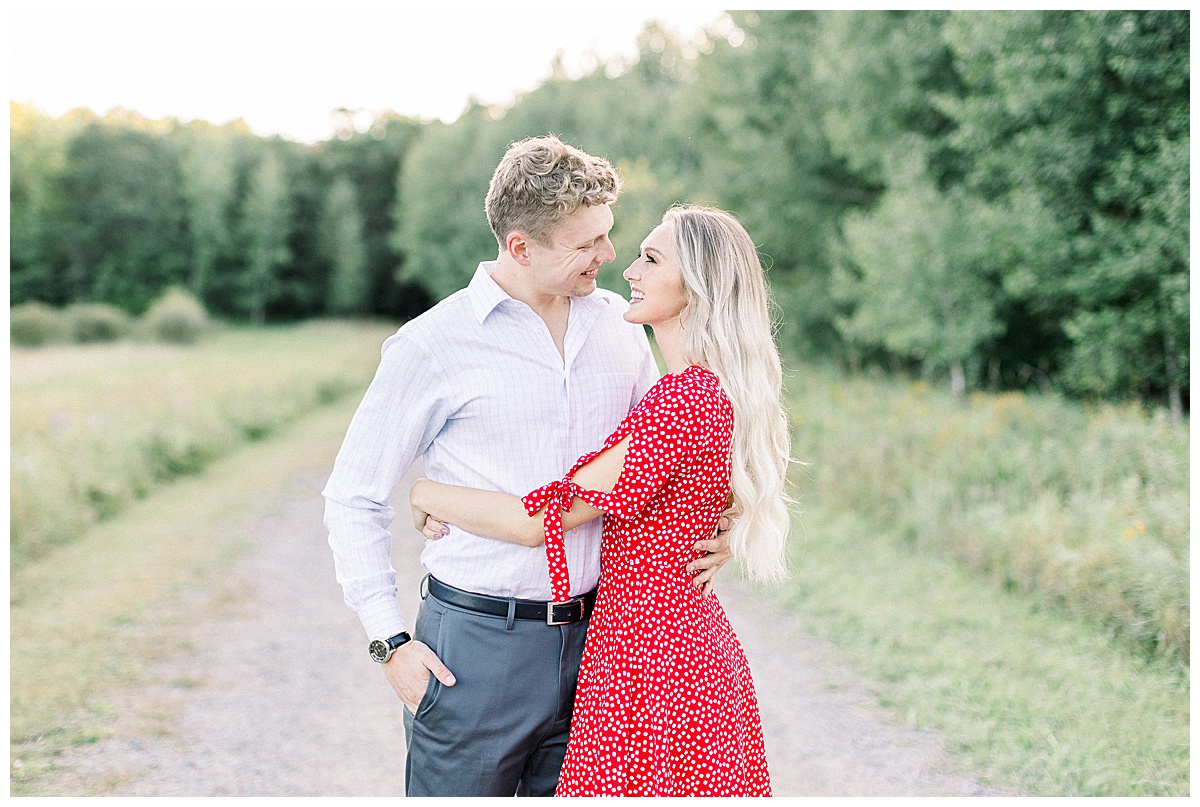 couple talking for engagement photos