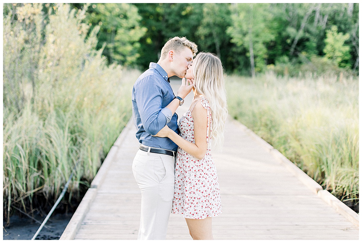 couple kissing at quarry park engagement photos