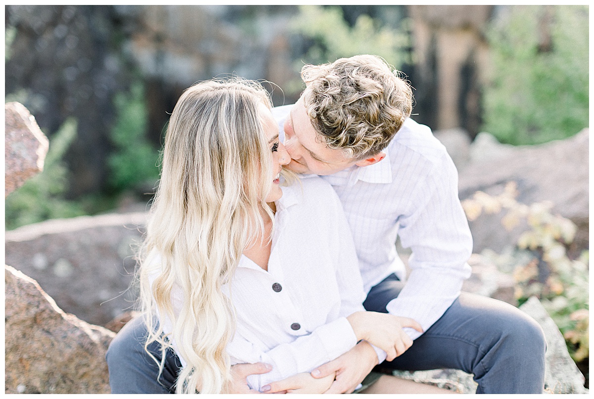 couple snuggling for engagement session