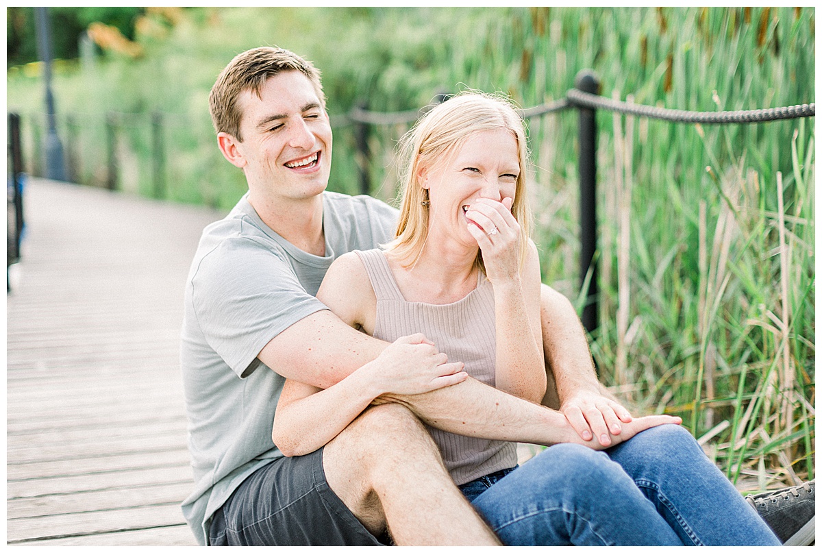 Couple laughing on dock