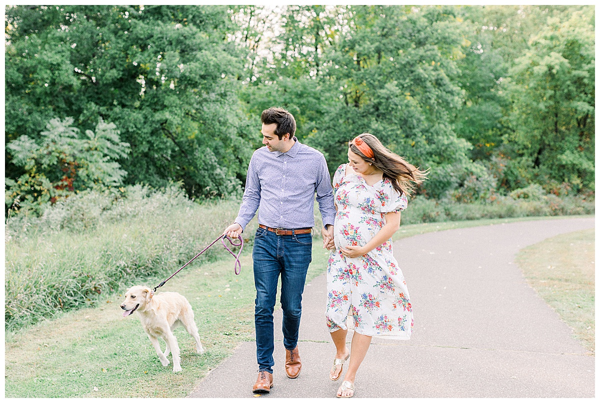 couple with dog for maternity photoshoot