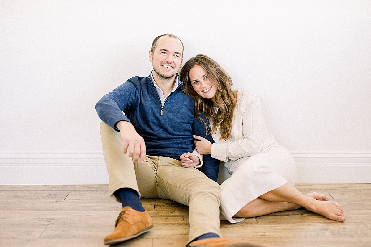 Engaged couple in photography studio