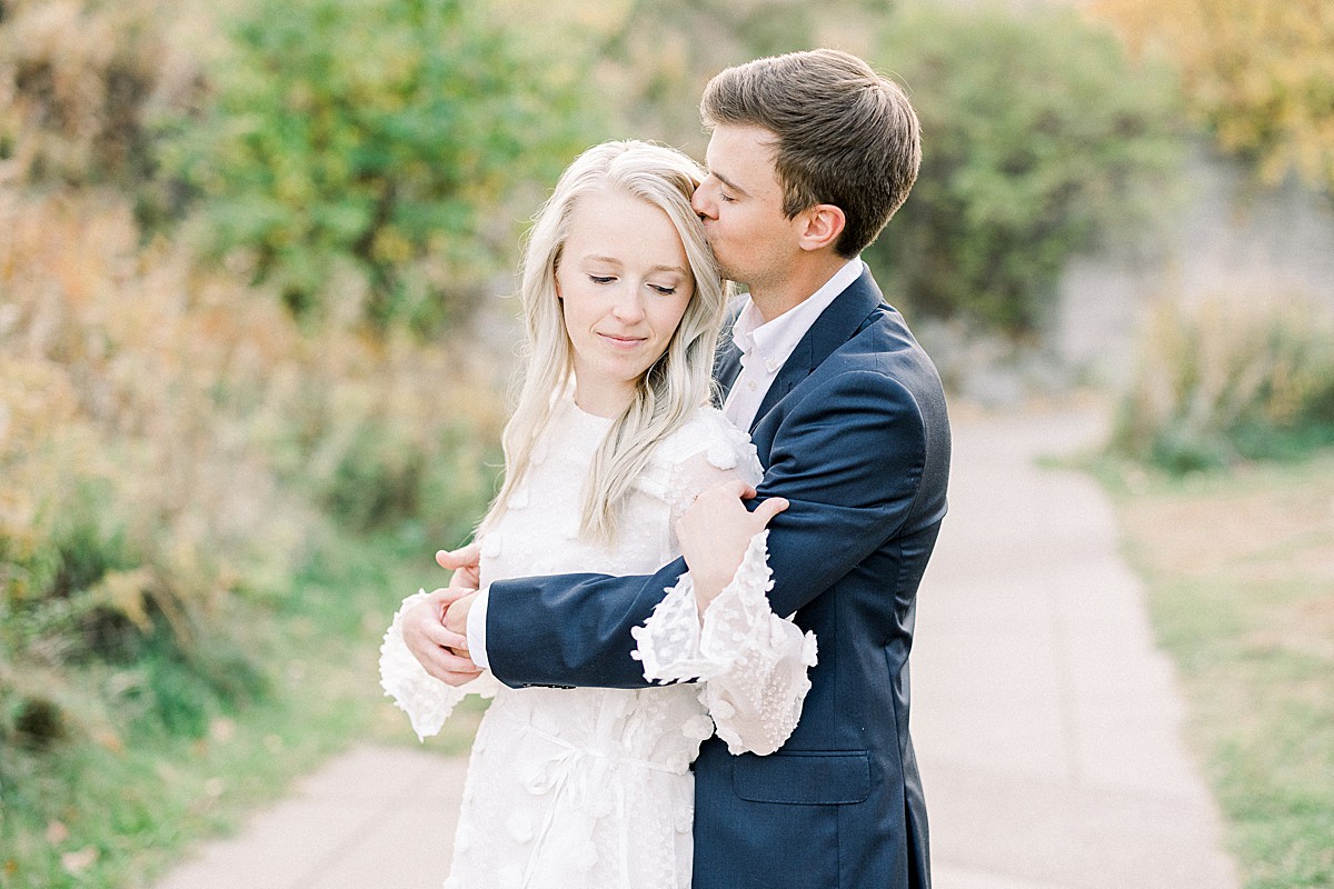 Mill Ruins Park engagement photo in dressy outfits