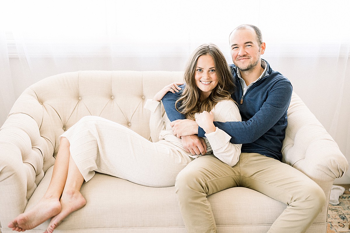 Studio engagement photo on couch