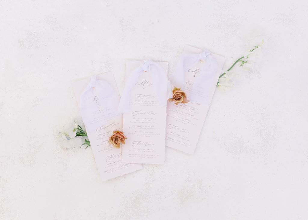 The wedding invitation inspiration was photographed with flowers and greenery from California.